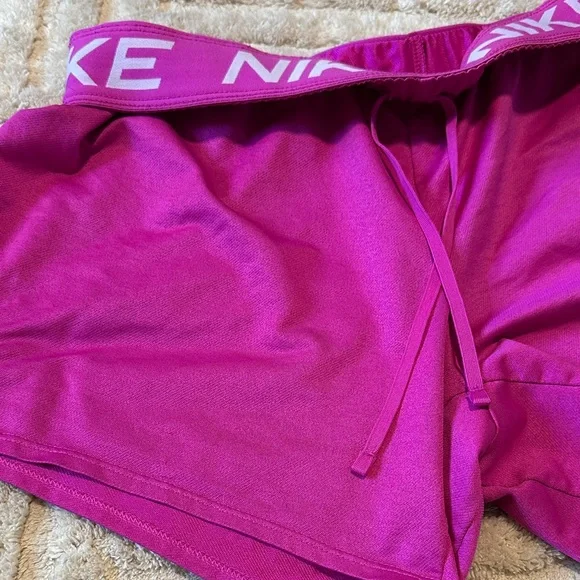 Nike Women's Magenta Athletic Shorts - Picture 5 of 12